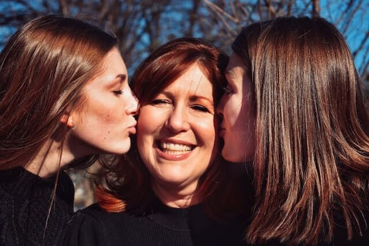 daughter kiss her mother